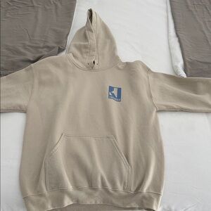 Beige Hoodie with Blue Logo
